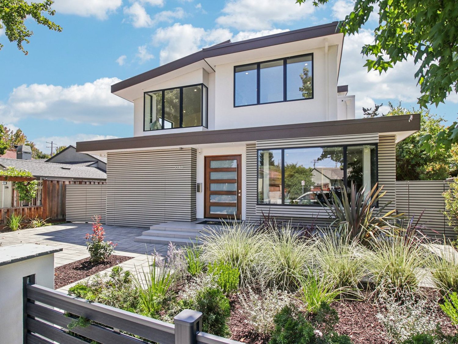 2280 St. Francis Drive — the front elevation with its new entry walk, planting and lawn
